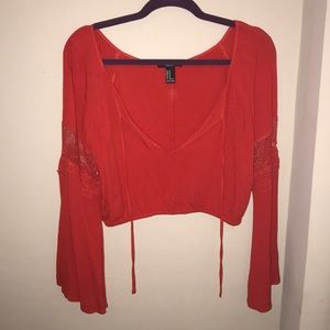 Red cropped bell sleeve top